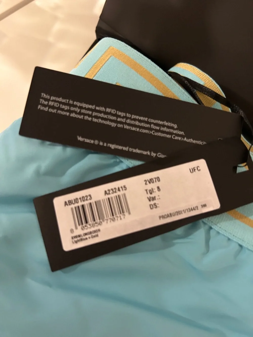 Versace Turquoise Swim Trunks with Gold Waistband - Picture 9 of 9